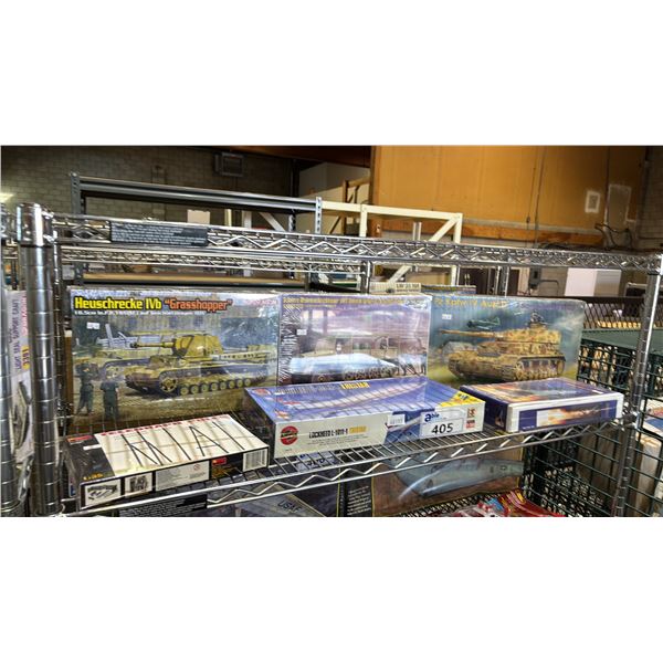 SHELF OF ASSORTED MODEL KITS: MILITARY VEHICLES, TELEGRAPH POLES, JUPITER C ROCKET & MORE