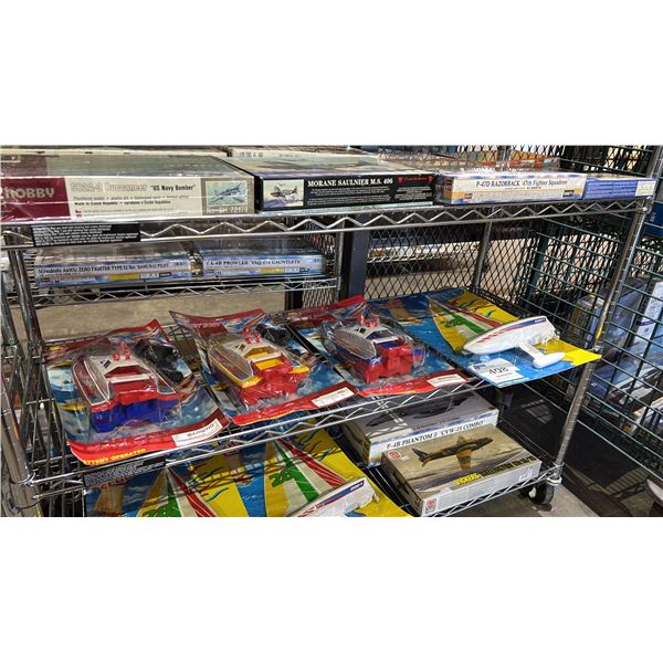 BATTERY OPERATED SAILBOAT & (3) RC OUTBOARD MOTOR BOATS