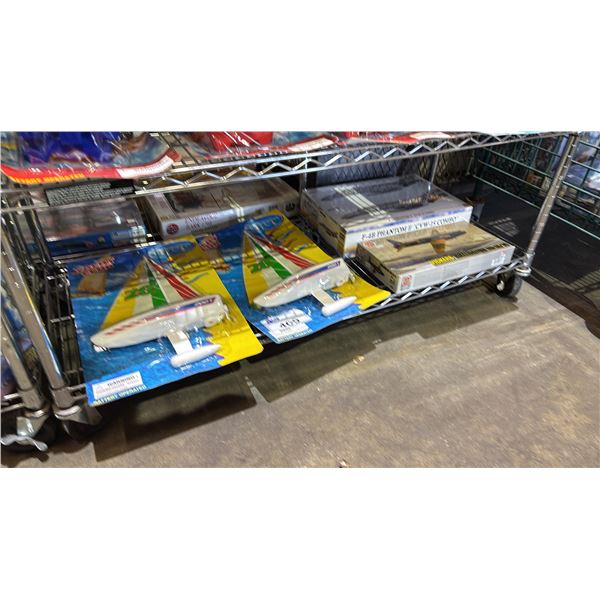 (2) BATTERY OPERATED SAILBOATS & (2) AIRPLANE MODEL KITS