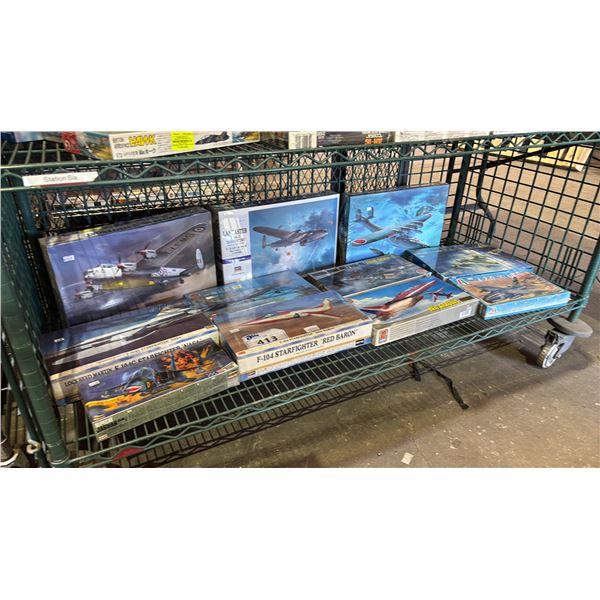 SHELF OF ASSORTED AIRPLANE MODEL KITS