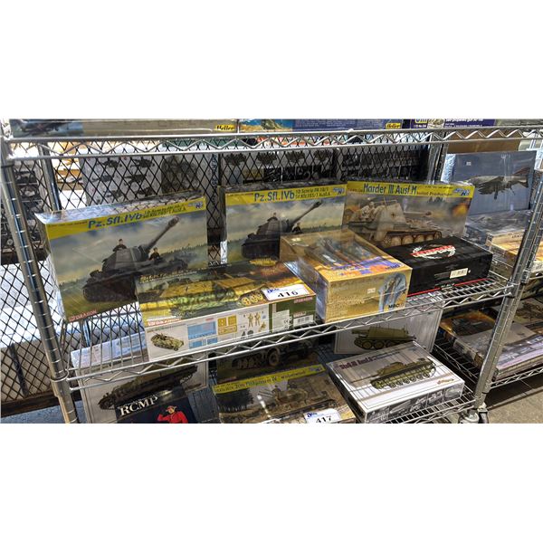 SHELF OF ASSORTED MODEL KITS: STARGATE RA, TANKS & MCLAREN FORD M23 G. VILLENEUVE RACECAR