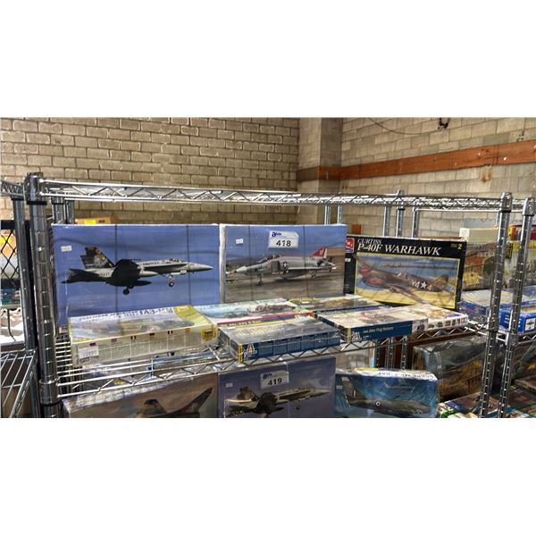 SHELF OF ASSORTED MODEL KITS: AIRPLANES, TANKS, IWO JIMA FLAG RAISERS & MORE