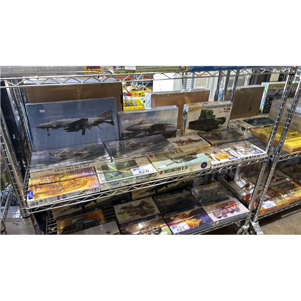 SHELF OF ASSORTED MODEL KITS: AIRPLANES, ANTI TANK VEHICLE, TANK, MILITARY MINIATURES & MORE