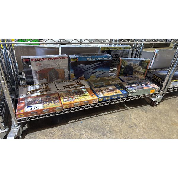 SHELF OF ASSORTED MODEL KITS: AIRPLANES, THATCHED COUNTRY HOUSE, VILLAGE WORKSHOP & MORE