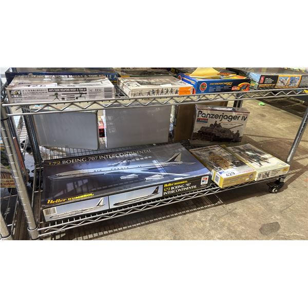 SHELF OF ASSORTED MODEL KITS