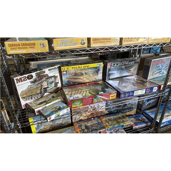 SHELF OF ASSORTED MODEL KITS: TANKS, ROCK BASE FOR FORTRESS, AIRPLANES & MORE