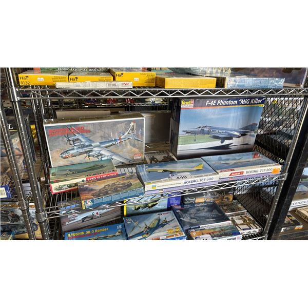 SHELF OF ASSORTED AIRPLANE MODEL KITS