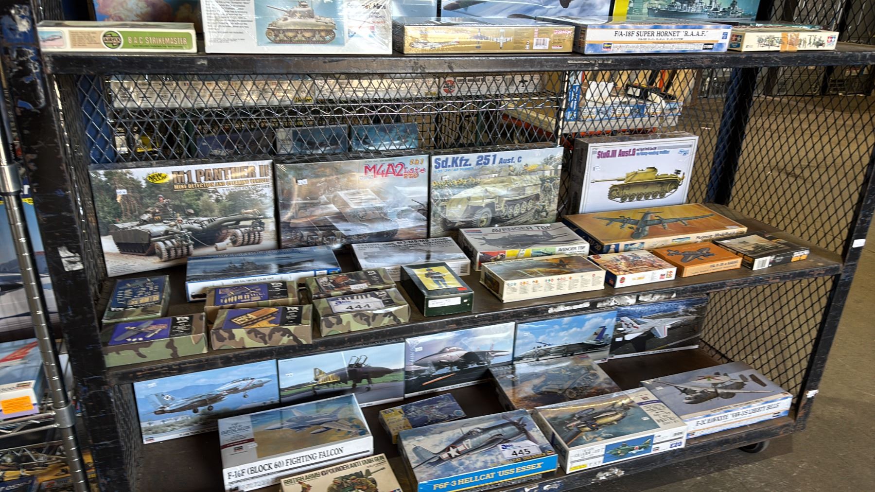 Model Tank Shelf SHELF OF ASSORTED MODEL KITS: TANKS, AIRPLANES, BOAT & MORE - Able Auctions