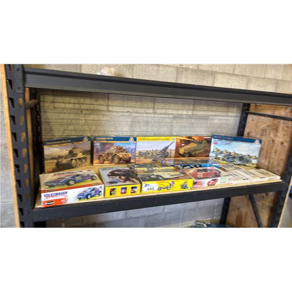 SHELF OF ASSORTED MODEL KITS & HEAD LIGHT MAGNIFYING GLASS