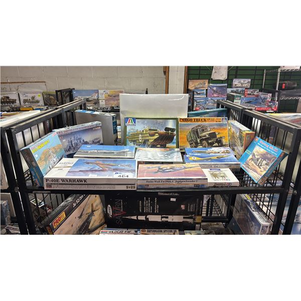 SHELF OF ASSORTED MODEL KITS; AIRLANES, MILITARY VEHICLES, THATCHED COUNTRY HOUSE & MORE