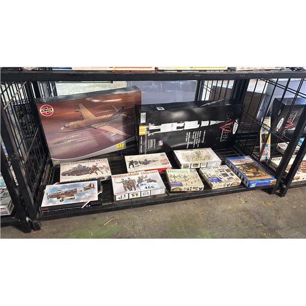 SHELF OF ASSORTED MODEL KITS: SATURN V ROCKET KIT, AIRCRAFT, ASSORTED FIGURE SETS & MORE