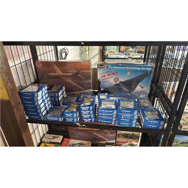 SHELF OF ASSORTED AIRPLANE MODEL KITS
