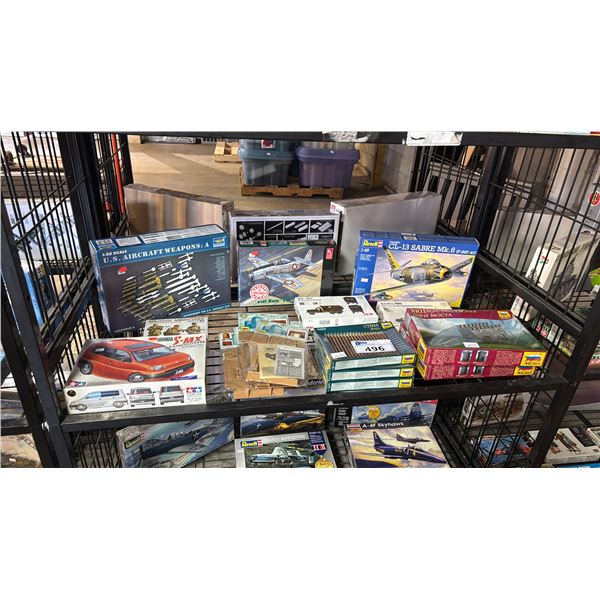 SHELF OF ASSORTED MODEL KITS: AIRPLANES, FORTRESS WALL WITH GATES, MILITARY VEHICLES & MORE