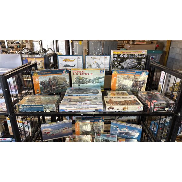 SHELF OF ASSORTED MODEL KITS: AIRPLANES, TANK, SUPPLY WAGONS & MORE