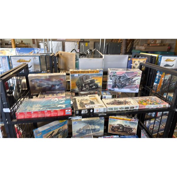 SHELF OF ASSORTED MODEL KITS: AIRPLANES, WATCHTOWER, CARGO TRUCK & MORE