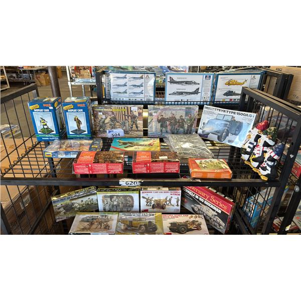 SHELF OF ASSORTED FIGURE DISPLAY CASES, AIRPLANE MODEL KIT, CHRISTMAS LIGHTS & MORE
