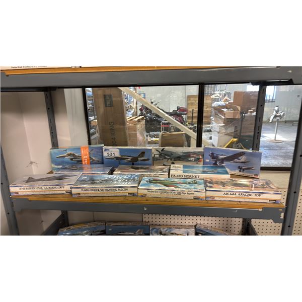 SHELF OF ASSORTED AIRPLANE MODEL KITS
