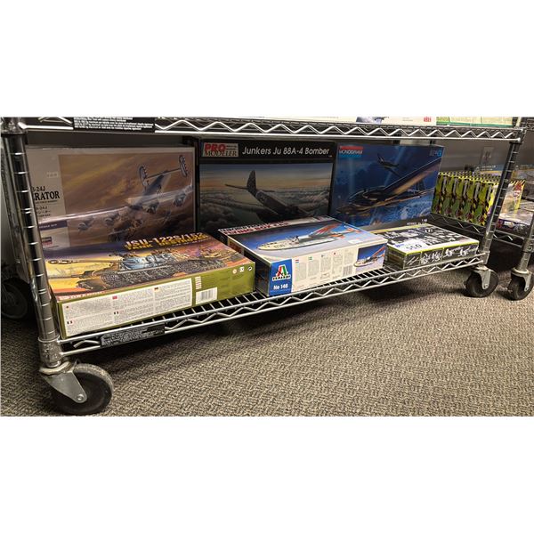 SHELF OF ASSORTED MODEL KITS: AIRPLANES, TANKS & MORE