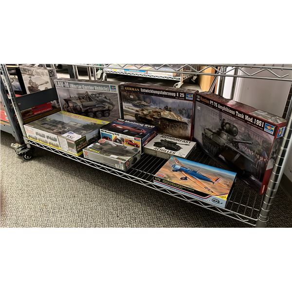 SHELF OF ASSORTED MODEL KITS: AIRPLANE, TANKS & RAILWAY