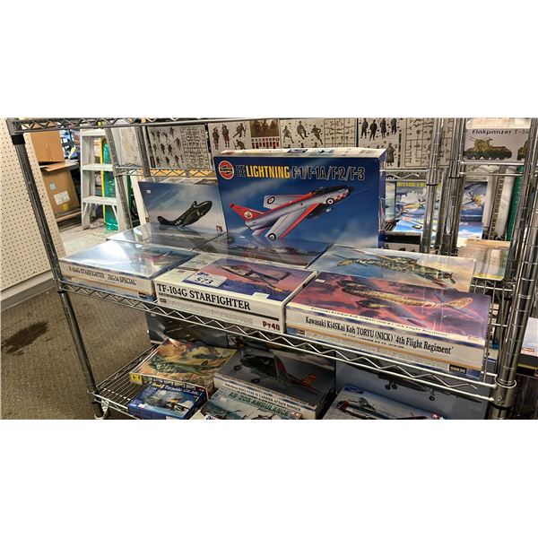 SHELF OF ASSORTED AIRPLANE MODEL KITS