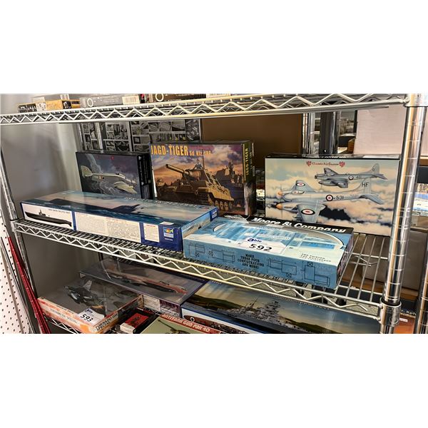 SHELF OF ASSORTED MODEL KITS: SUBMARINE, WAREHOUSE, TANK & AIRPLANES