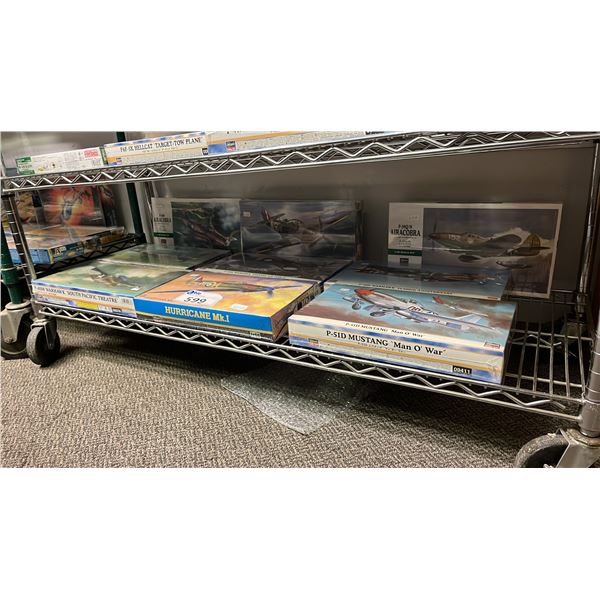 SHELF OF ASSORTED AIRPLANE MODEL KITS