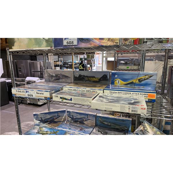 SHELF OF ASSORTED AIRPLANE MODEL KITS