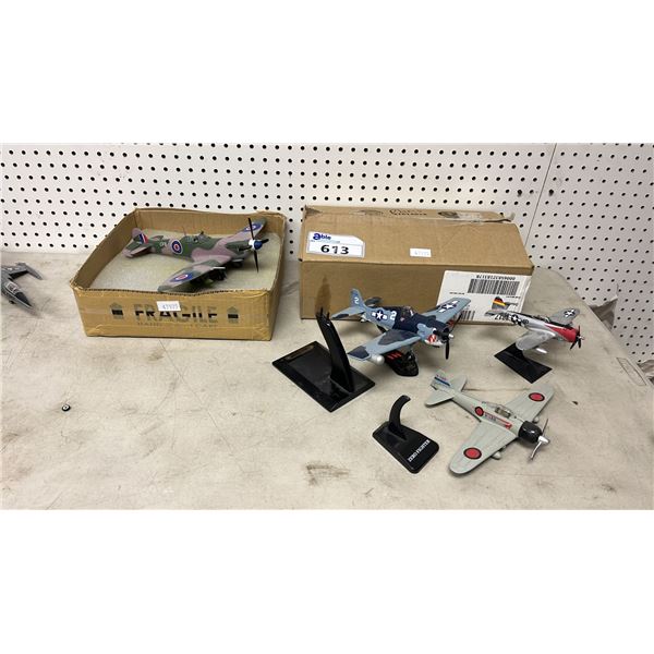 (4) ASSORTED SCALE MODEL AIRPLANES WITH STAND: *ONE STAND NEEDS REPAIR*