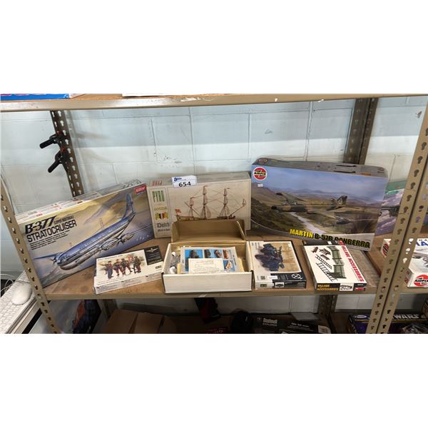SHELF OF ASSORTED MODEL KITS: AIRPLANES, SHIPS, MILITARY VEHICLES & MORE
