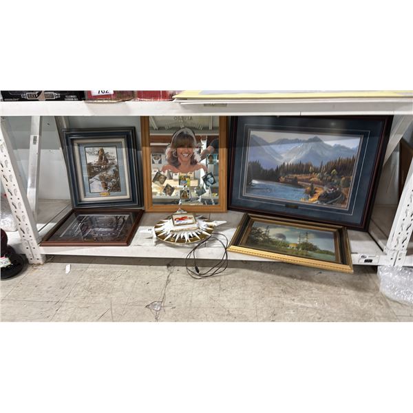SHELF OF ASSORTED FRAMED PRINTS, OLIVIA NEWTON JOHN MIRROR & LUCKY LAGER LIGHT-UP SIGN