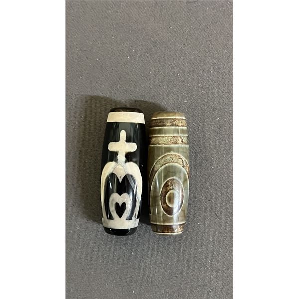 PAIR OF SINO-TIBETAN DZI BEADS