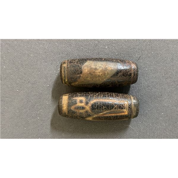 PAIR OF MOTTLED RUSSET DZI BEADS