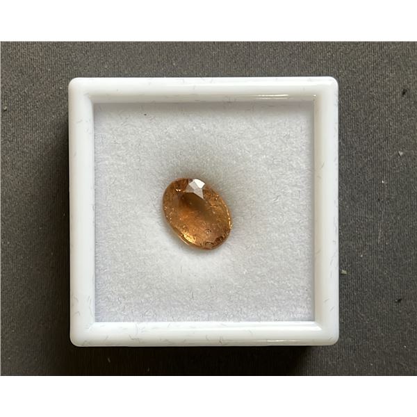 6.1CT OVAL CUT NATURAL TOPAZ: UNTREATED (8.9MM X 12.2MM)