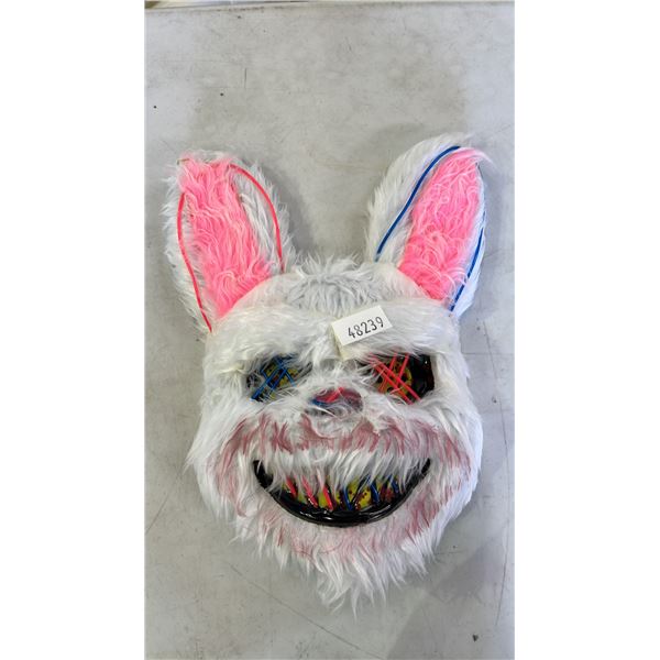STACK OF SCARY EASTER BUNNY LIGHT-UP FACE MASKS