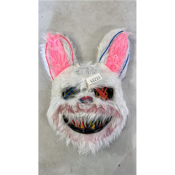 STACK OF SCARY EASTER BUNNY LIGHT-UP FACE MASKS