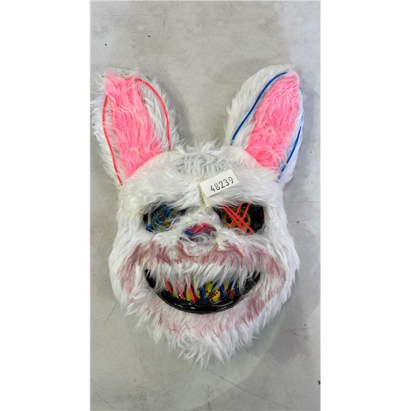 STACK OF SCARY EASTER BUNNY LIGHT-UP FACE MASKS