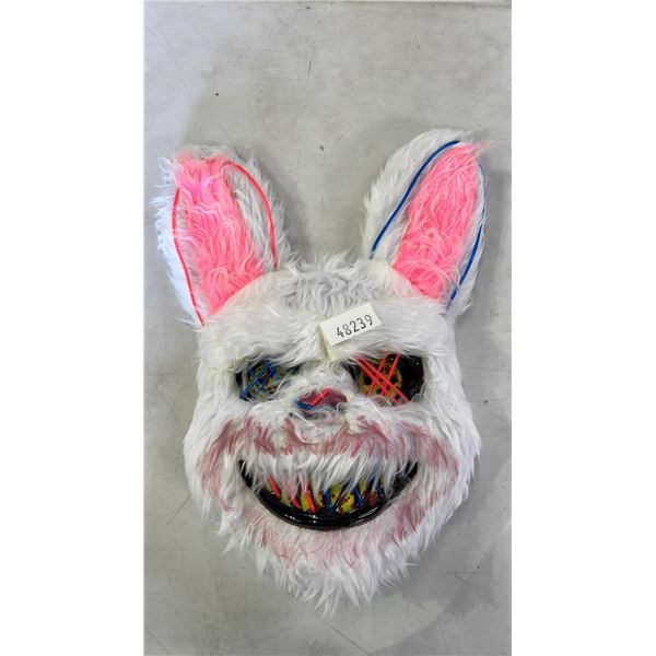 STACK OF SCARY EASTER BUNNY LIGHT-UP FACE MASKS