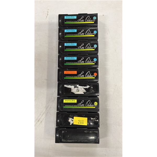 (9) ASSORTED LEE OSKAR HARMONICAS IN CASES