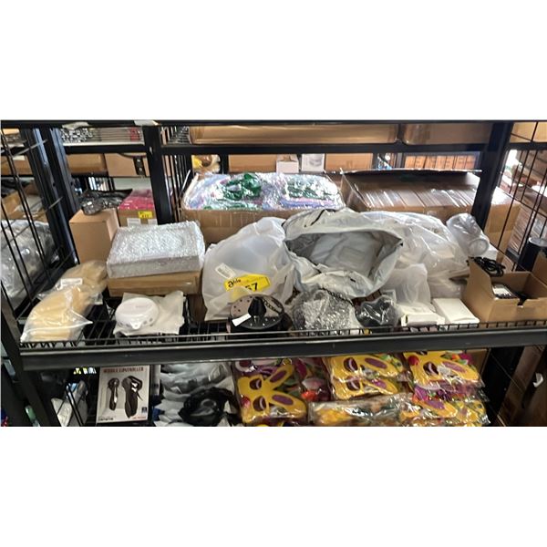 SHELF OF ASSORTED ITEMS INCLUDING; BED BELL, HOME DECOR, BOTTLE CAPS, BATTERY CHARGER & MORE