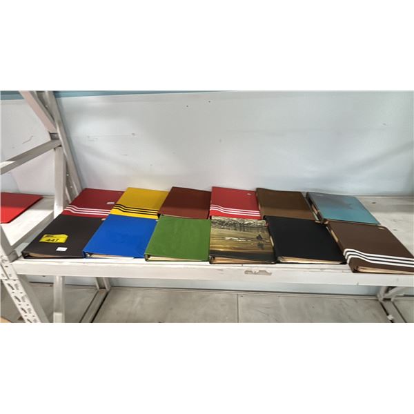 SHELF OF ASSORTED BINDERS OF STAMPS