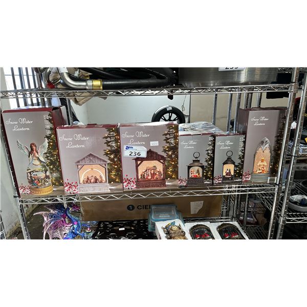 SHELF OF ASSORTED LED SNOW WATER LANTERNS