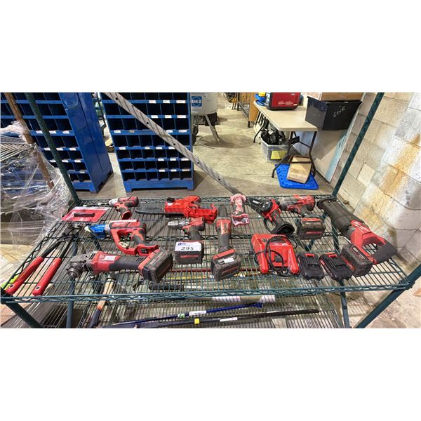 SHELF OF ASSORTED MILWAUKEE TOOLS BATTERIES & CHARGER