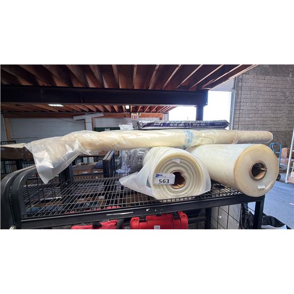 SHELF OF INDUSTRIAL PLASTIC FILM ROLLS