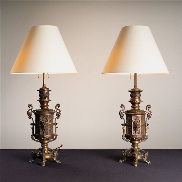 Pair of Bronze Lamps with High Relief Mascarons & Foliate Scrolls