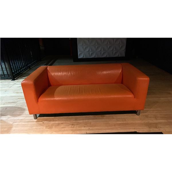 ORANGE LEATHER APARTMENT SIZE SMALL SOFA - APPROX. 6FT