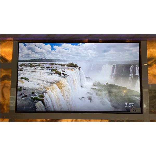 55" TCL TV WITH WALL MOUNT *NO REMOTE* *BUYER WILL REQUIRE LADDER & TOOLS TO DETACH FROM WALL*