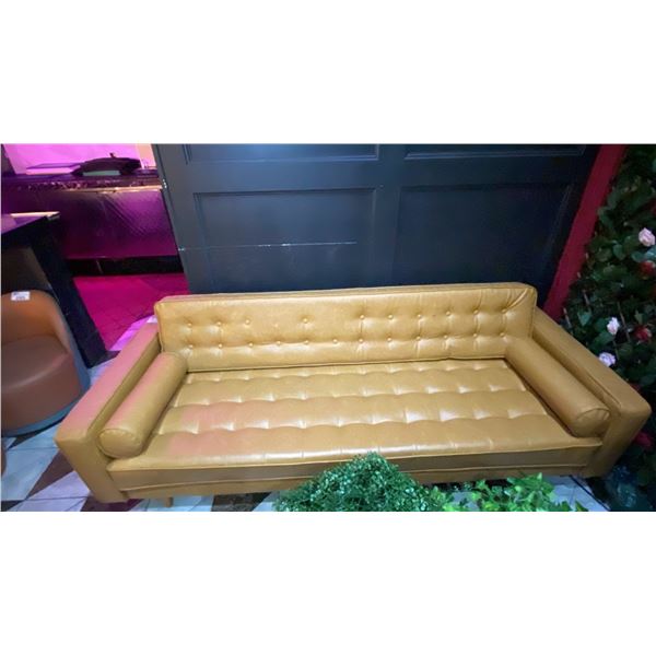 TAN VINYL UPHOLSTERED RETRO INSPIRED APPROX. 7FT SOFA *SEVERAL BUTTONS ARE MISSING*