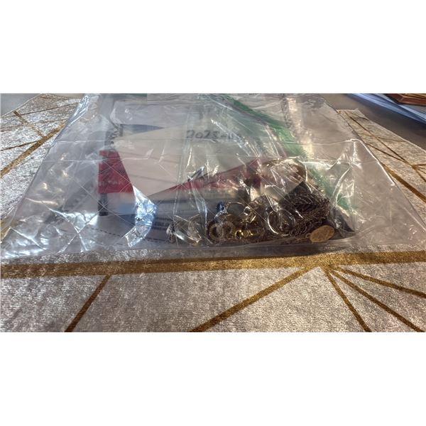 BAG OF MISC COSTUME JEWELRY