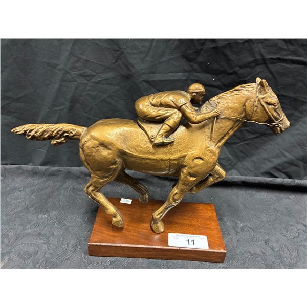Heavy bronze statue of horse with jockey 14" long