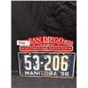 Image 1 : 1936 Manitoba license plate with San Diego topper
